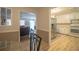 View of kitchen with white cabinets, gas range and stainless steel refrigerator at 70 E Honeysuckle Ln, Carrollton, GA 30116