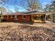 Brick ranch house with sunroom and large backyard at 2694 Hedgewood Nw Dr, Atlanta, GA 30311