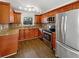 Updated kitchen with stainless steel appliances and wood cabinets at 2694 Hedgewood Nw Dr, Atlanta, GA 30311