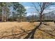 Relaxing common area with benches and picnic tables at 301 Ashbourne Trl, Lawrenceville, GA 30043