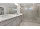 Spa-like bathroom with a large walk-in shower and double vanity at 2065 Morrison Ave, Brookhaven, GA 30319
