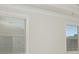 Bright bedroom with two windows and neutral walls at 2065 Morrison Ave, Brookhaven, GA 30319