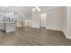 Spacious dining room with hardwood floors and large windows at 2065 Morrison Ave, Brookhaven, GA 30319