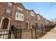 Townhouse community featuring three-story brick homes at 2065 Morrison Ave, Brookhaven, GA 30319