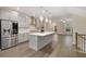 Modern kitchen with gray cabinets, quartz countertops, and stainless steel appliances at 2065 Morrison Ave, Brookhaven, GA 30319