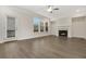 Spacious living room featuring hardwood floors and fireplace at 2065 Morrison Ave, Brookhaven, GA 30319