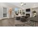 Living room with fireplace, hardwood floors and access to balcony at 2065 Morrison Ave, Brookhaven, GA 30319