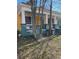 Yellow house with wrap-around porch and mature trees at 1786 Lakewood Ave, Atlanta, GA 30315