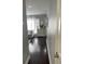 Bright hallway with hardwood floors leading to living room at 1805 Ashborough Se Cir # D, Marietta, GA 30067