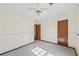 Bedroom with ceiling fan and carpet flooring at 5711 Rally Ct, Rex, GA 30273