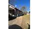 Side view of house showing additional parking and yard at 1839 Lakewood Ave, Atlanta, GA 30315