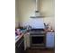 Renovated kitchen with stainless steel appliances and white cabinets at 1839 Lakewood Ave, Atlanta, GA 30315