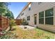 Small backyard with patio and wooden fence at 5531 Radford Loop, Fairburn, GA 30213