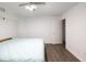Spacious basement bedroom with wood-look flooring at 308 Mainsail Ln, Woodstock, GA 30189