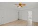 Bright bedroom with hardwood floors and ceiling fan at 308 Mainsail Ln, Woodstock, GA 30189