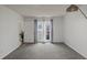 Bright and airy bedroom with large windows and gray carpet at 308 Mainsail Ln, Woodstock, GA 30189