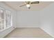Simple bedroom with light walls and wood-look floors at 308 Mainsail Ln, Woodstock, GA 30189