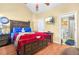 Spacious main bedroom with a large bed and TV at 9569 Lakeview Cir, Union City, GA 30291