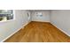 Spacious living room featuring new laminate flooring at 3187 Clifton Church Rd, Atlanta, GA 30316