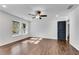 Bright bedroom with hardwood floors and an accent wall at 1760 Corley Dr, Smyrna, GA 30126