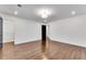 Hardwood floor bedroom with walk-in closet and window at 1760 Corley Dr, Smyrna, GA 30126