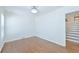 Bright bedroom with hardwood floors and access to a staircase at 2340 Highview Sw Rd, Atlanta, GA 30311