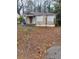 Fixer-upper house with boarded windows at 1409 Mims St, Atlanta, GA 30314