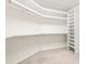 Spacious walk-in closet with ample shelving and hanging rods at 3657 Peachtree Ne Rd # 3C, Atlanta, GA 30319