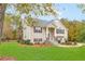 Two-story house with a spacious lawn and mature trees at 6890 Fletcher Dr, Winston, GA 30187