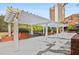 Brick patio area with pergola and bench, offering a relaxing outdoor space at 387 Ralph Mcgill Ne Blvd # E, Atlanta, GA 30312