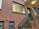 Brick building exterior with stairs and large windows at 1148 Briarcliff Ne Rd # 1, Atlanta, GA 30306