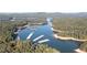 Aerial view of lake with multiple boat docks at 140 Kingsley Way, Acworth, GA 30102