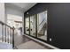 Bright entryway with hardwood floors, gold mirrors, and a staircase at 139 Kingsley Way, Acworth, GA 30102