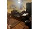 Spacious bedroom with hardwood floors and a large bed at 5623 Westhill Cir, Atlanta, GA 30349