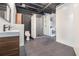 Modern bathroom with walk-in shower and dark gray tile floors at 878 Peachtree Ne St # 711, Atlanta, GA 30309