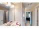 Bright bathroom with a vanity and mirror at 3810 Reserve Overlook Lot14 Way, Cumming, GA 30041
