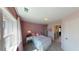 Charming bedroom with floral bedding and a window at 3810 Reserve Overlook Lot14 Way, Cumming, GA 30041