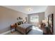 Bright bedroom with large window and neutral decor at 3810 Reserve Overlook Lot14 Way, Cumming, GA 30041