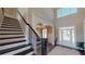Grand two story entryway with hardwood floors and open staircase at 3810 Reserve Overlook Lot14 Way, Cumming, GA 30041