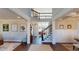 Two-story foyer with staircase, hardwood floors, and art at 3810 Reserve Overlook Lot14 Way, Cumming, GA 30041