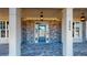 Brick front porch with blue door and columns at 3810 Reserve Overlook Lot14 Way, Cumming, GA 30041