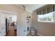 Convenient laundry room with built-in shelving and window at 3810 Reserve Overlook Lot14 Way, Cumming, GA 30041