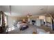 Main bedroom with sitting area, large windows, and TV at 3810 Reserve Overlook Lot14 Way, Cumming, GA 30041