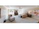 Spacious main bedroom with sitting area and large windows at 3810 Reserve Overlook Lot14 Way, Cumming, GA 30041