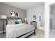 Spacious bedroom with stylish decor and en-suite bathroom at 353 Skylar Se Way, Atlanta, GA 30315