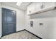 Functional laundry room with upper cabinets and tiled floor at 2447 Lynn Iris Dr, Decatur, GA 30032