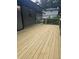 Spacious deck with wooden flooring and black metal railings at 2449 Maclaren Cir, Dunwoody, GA 30360