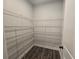 Large walk-in pantry with wire shelving; great for storage at 7474 Waterview Cv, Douglasville, GA 30135