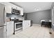 Kitchen with stainless steel appliances and granite countertops at 1203 Willow Nw Ct, Kennesaw, GA 30152