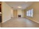 Living room with stone fireplace and hardwood floors at 8138 Brookbend Dr, Douglasville, GA 30134